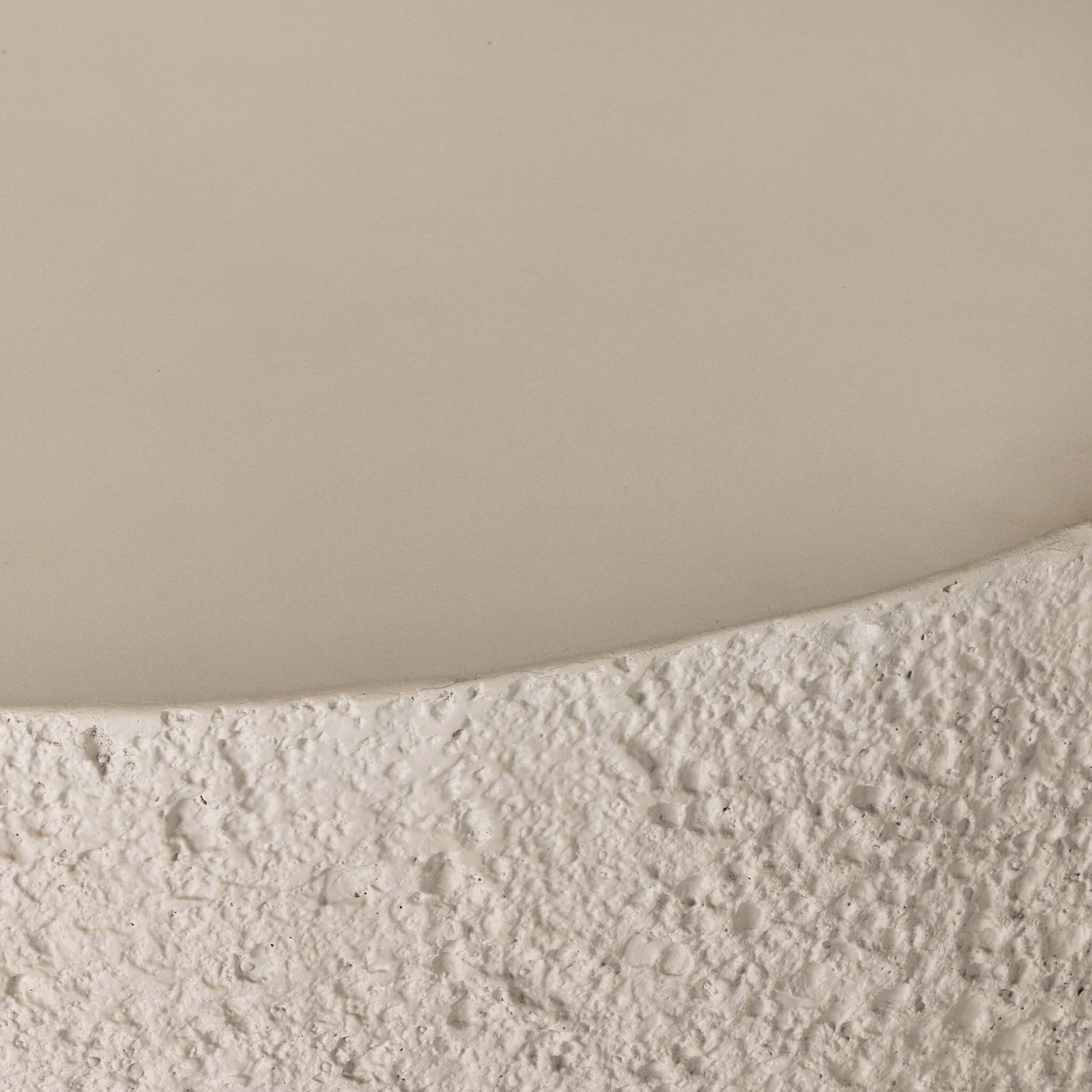Close-up of the Kember Outdoor Coffee Table, Matte Stone showcasing its textured surface and sleek design.