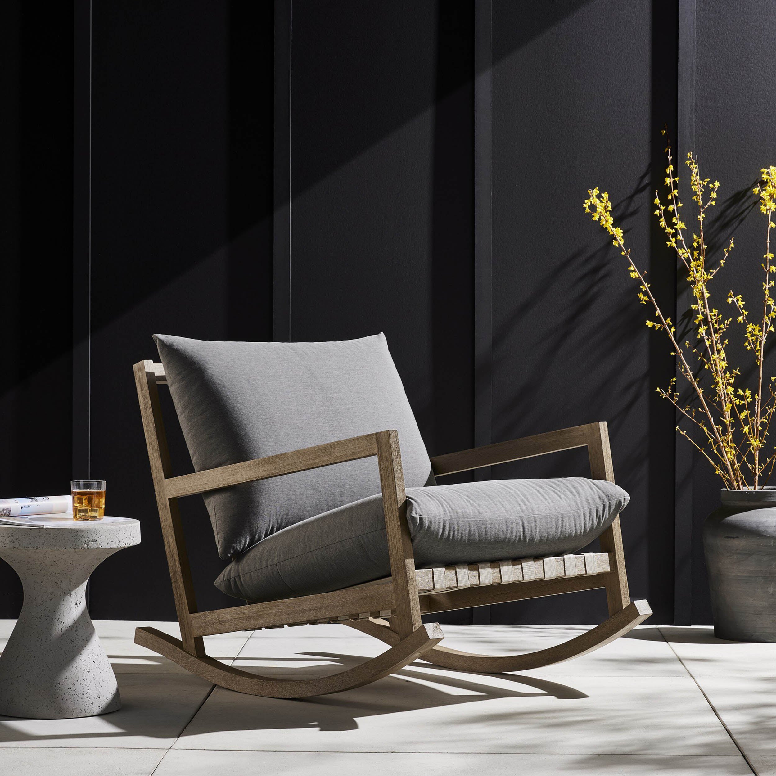 Aiken Outdoor Rocking Chair, Venao Charcoal displayed in modern outdoor setting.