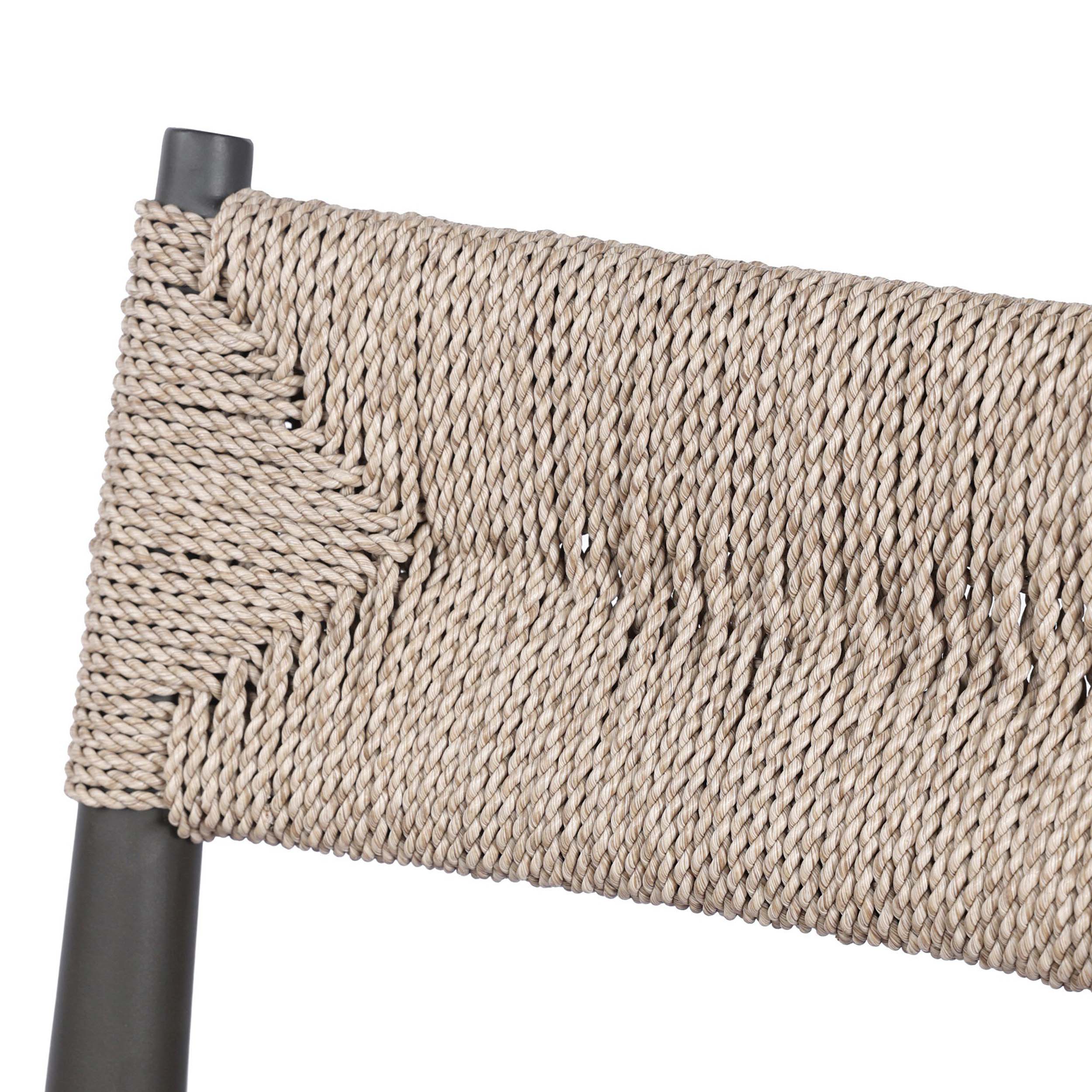 Lomas Outdoor Metal Bar + Counter Stool, Textured Dune close-up of woven all-weather wicker seat for outdoor comfort.