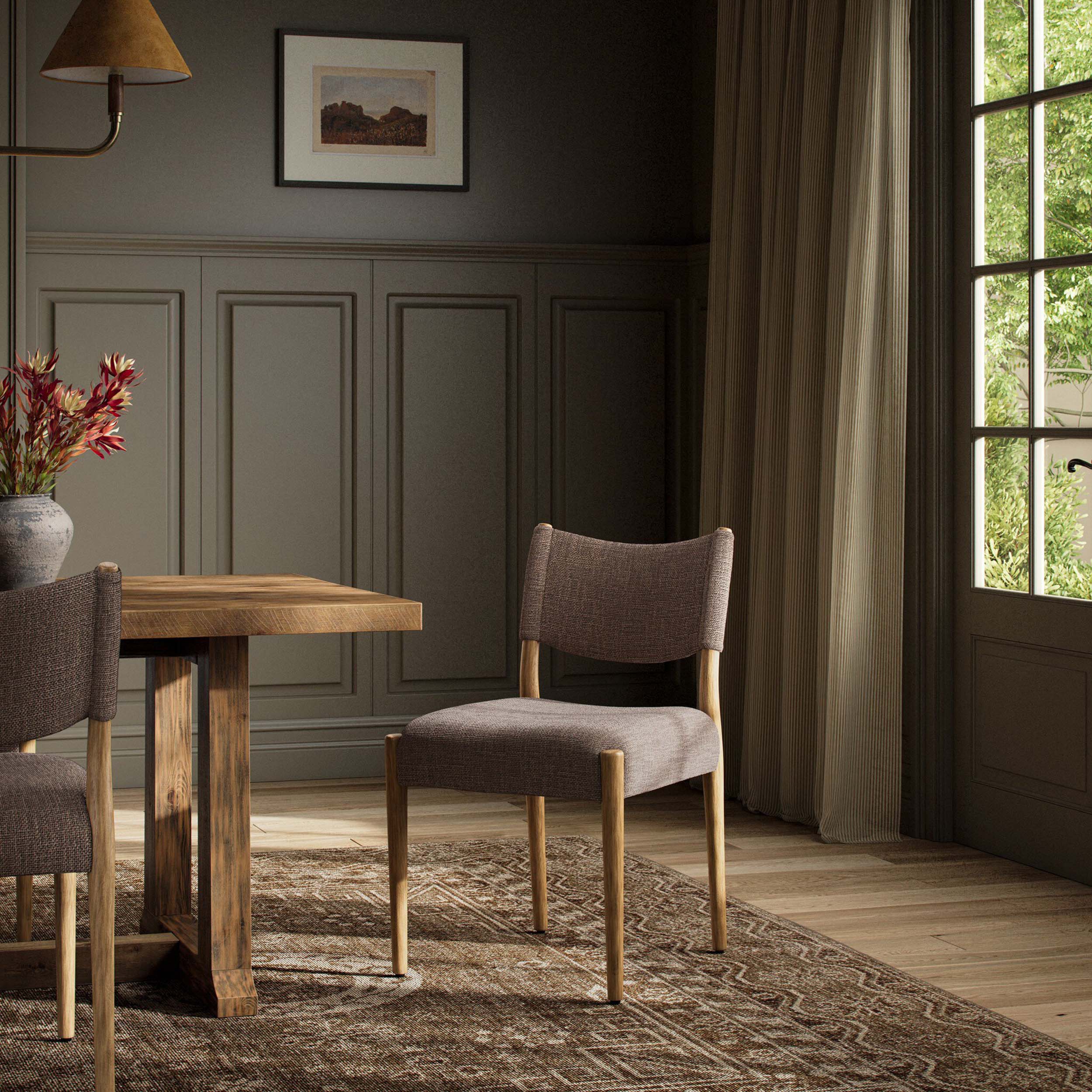 Jayla Armless Dining Chair, Saxon Mink, Set of 2 featured in a cozy dining room setting.