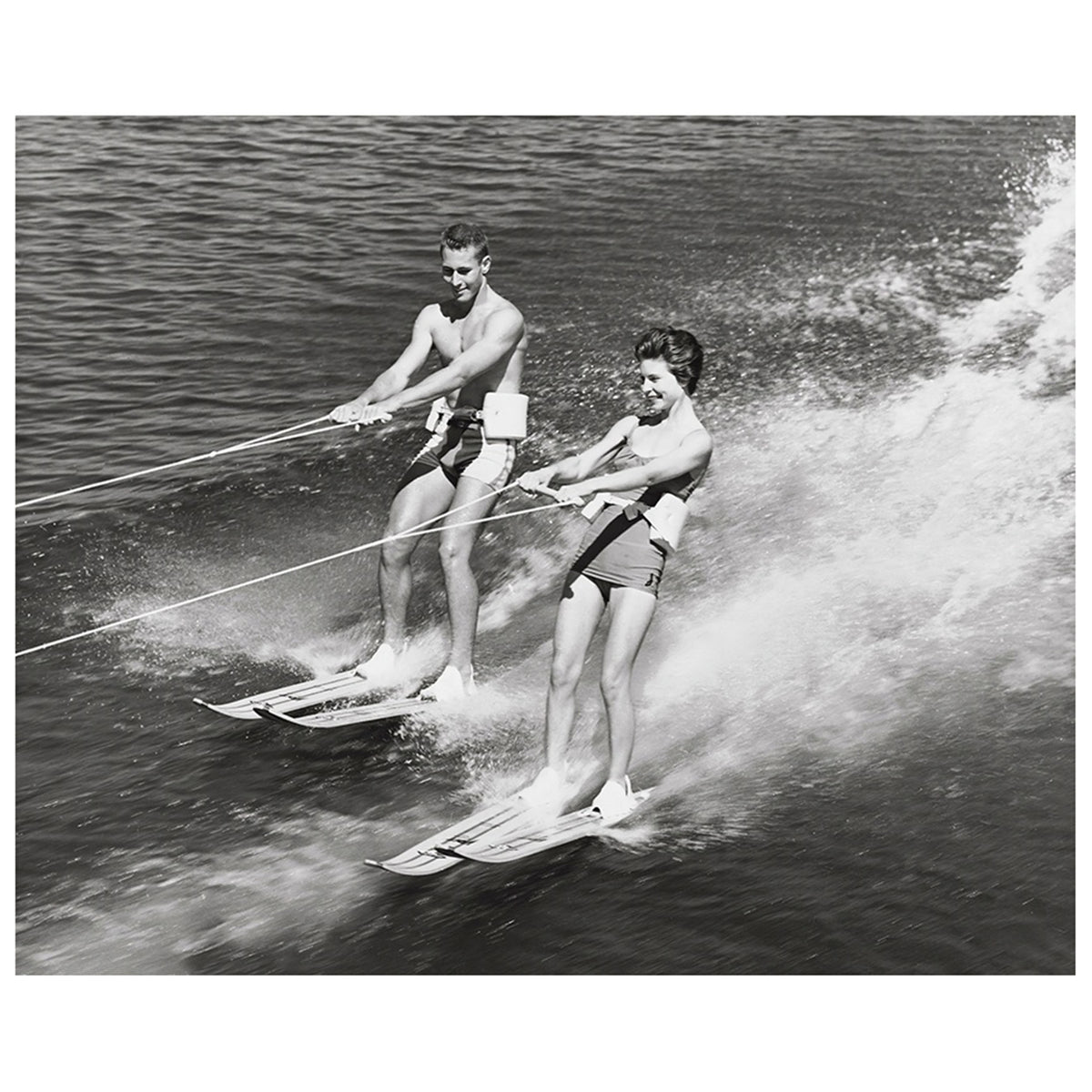 Young Couple Waterskiing