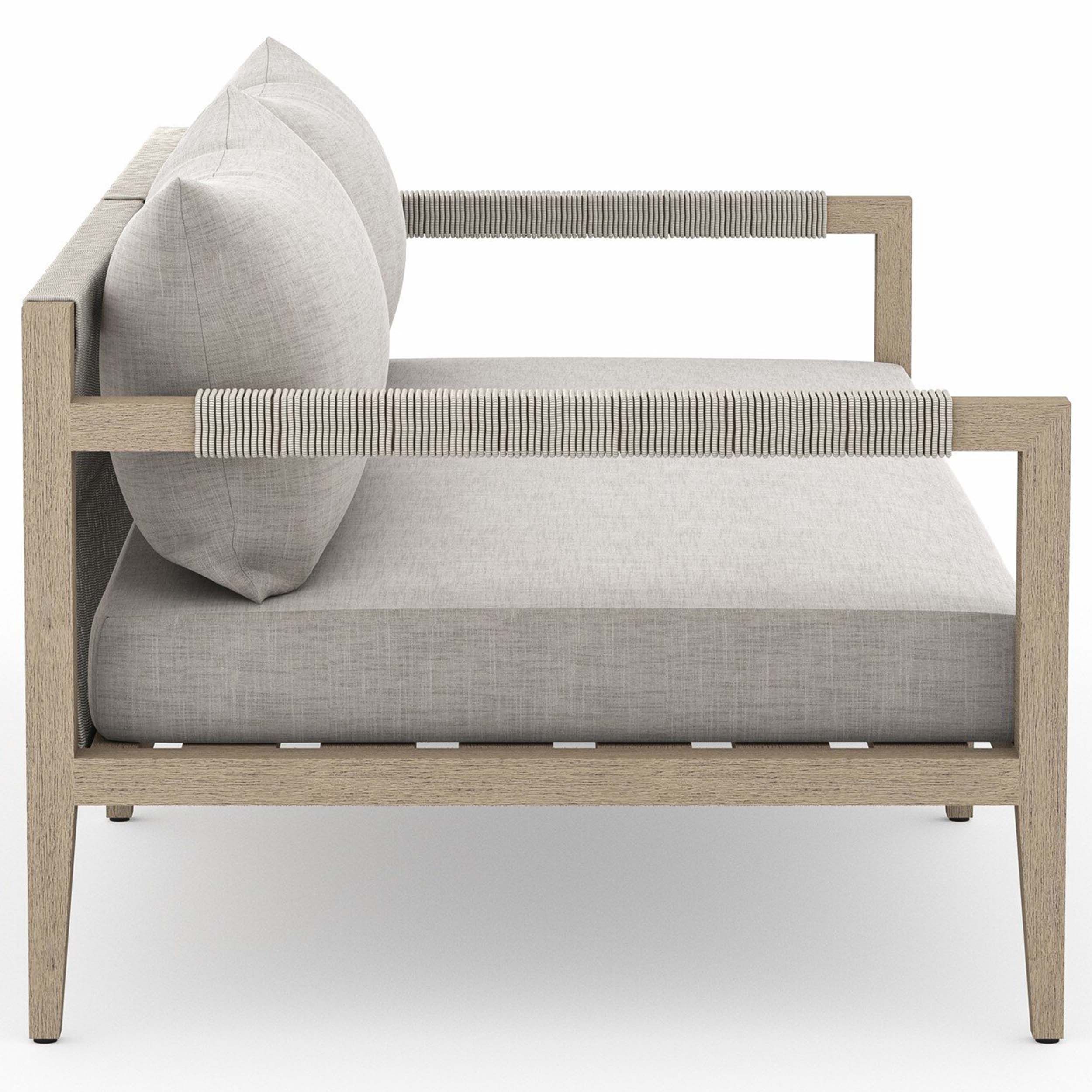 Sherwood Outdoor Sofa, Washed Brown, Venao Charcoal with plush cushions and linear frame detail.